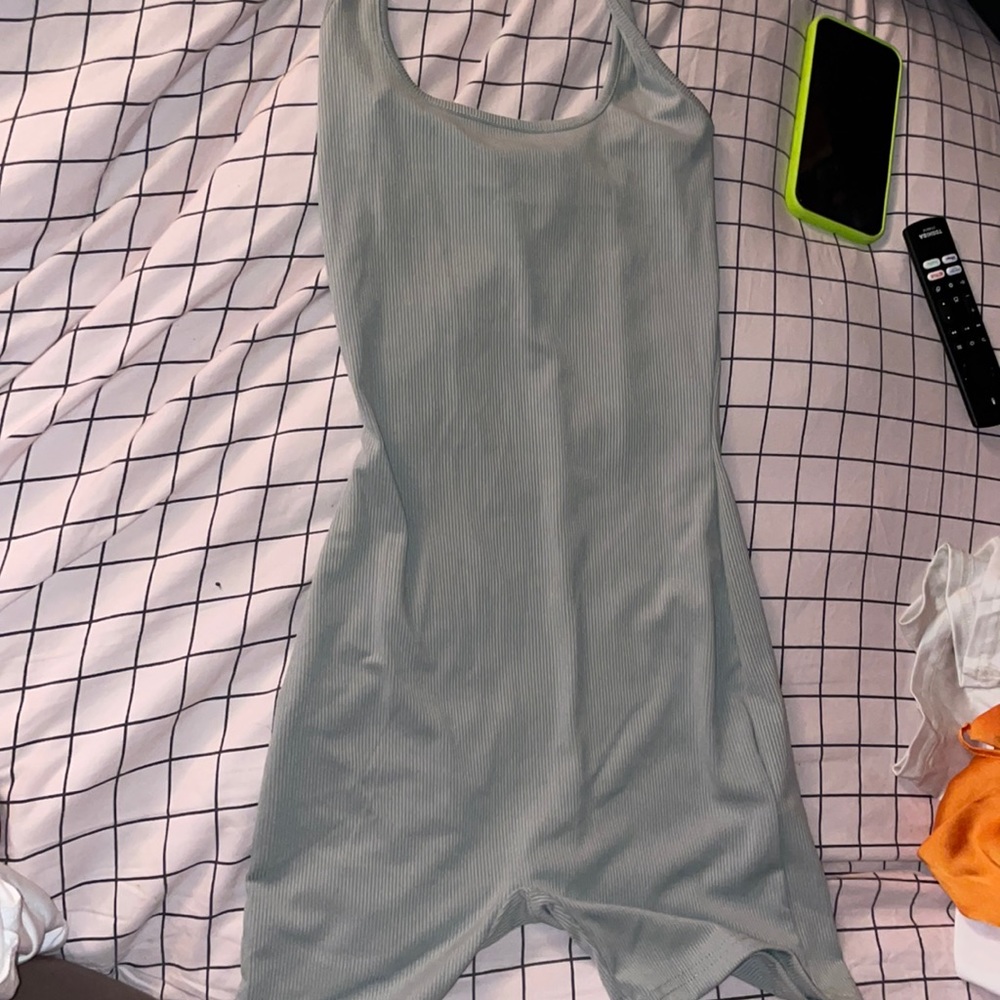 Never worn size xs romper!  It is ribbed.